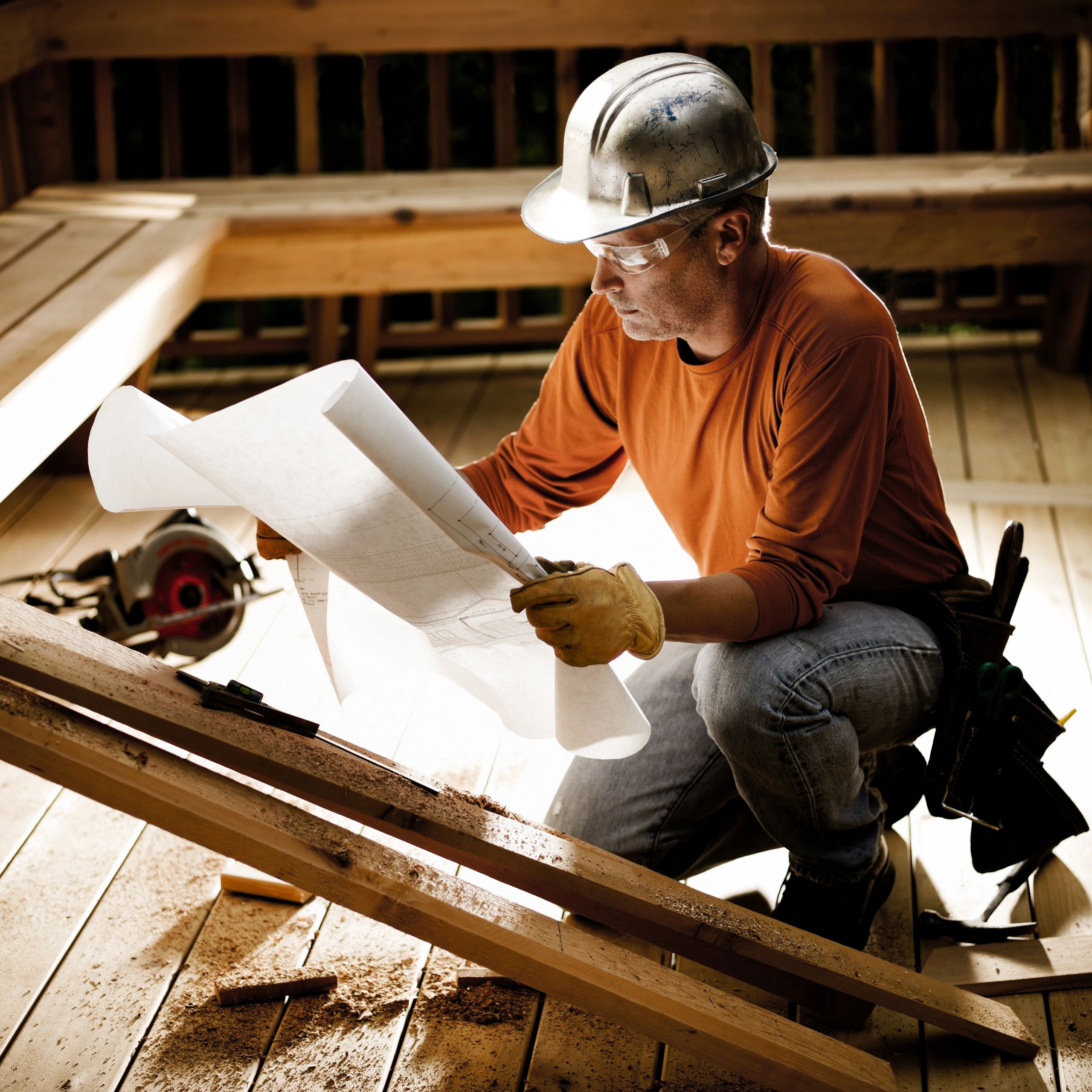 Construction professional reviewing plans