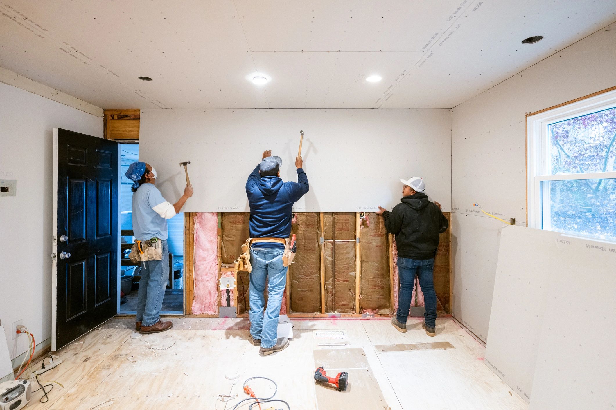 Crew working on interior repair and renovation carpentry
