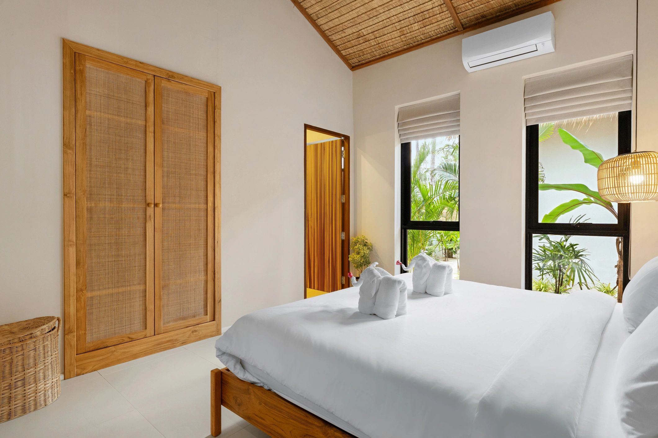 Interior bedroom with detailed trim and finished woodwork