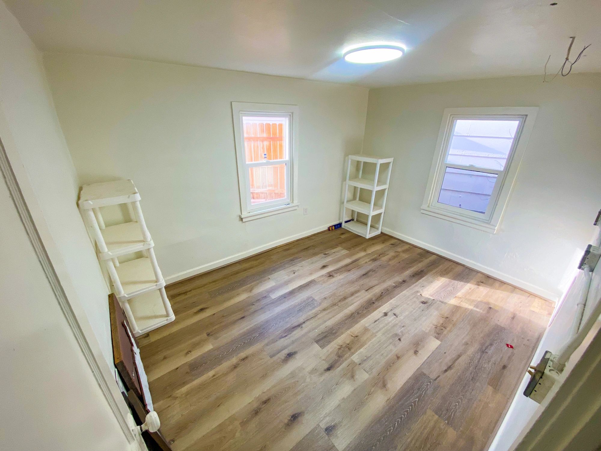 Bright interior room with clean flooring and natural light