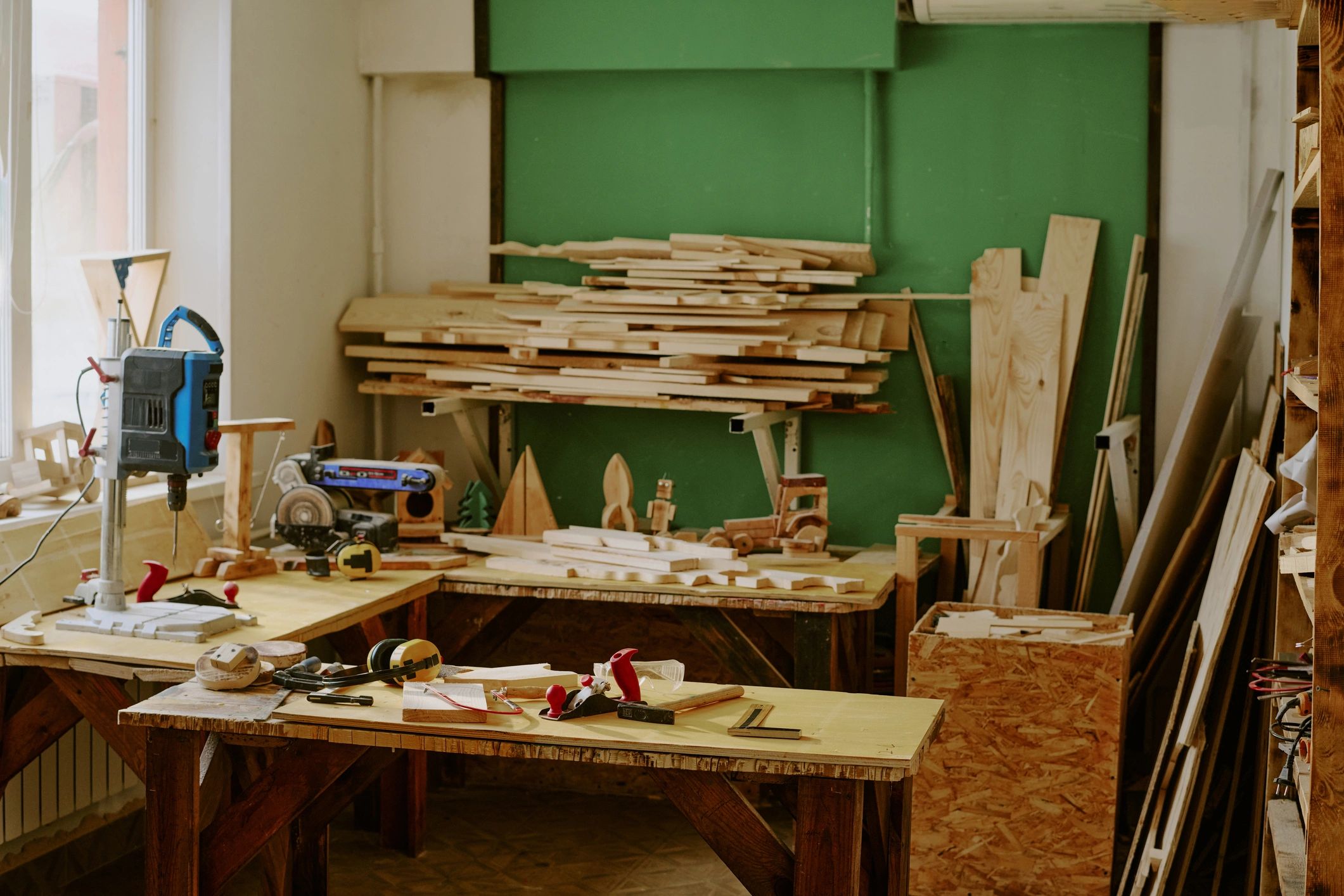 Woodworking tools and lumber for carpentry repair work